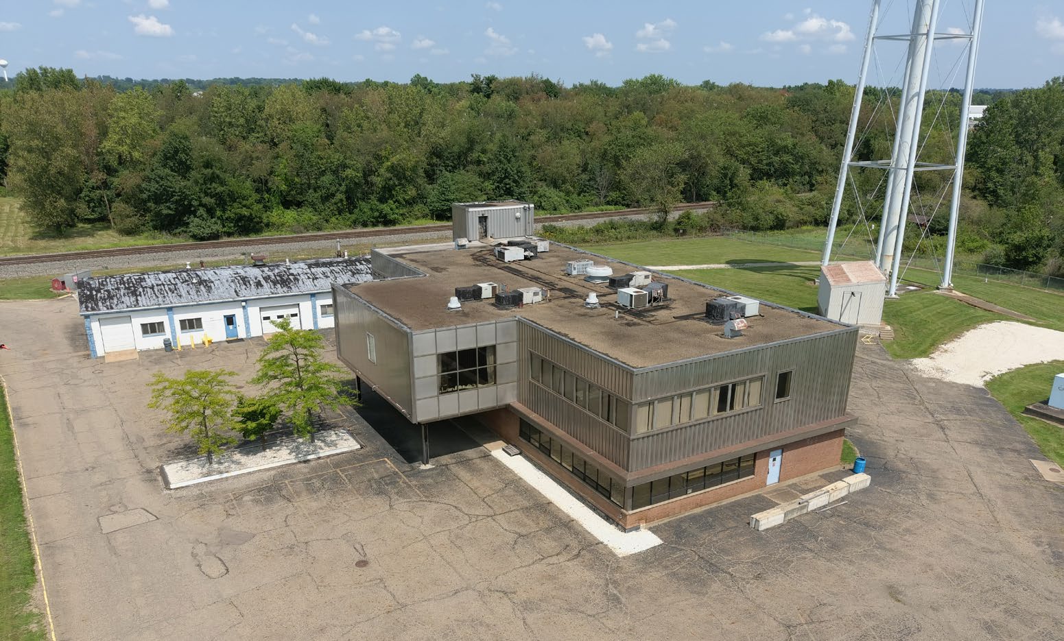 Aerial view of the offices and metallurgical lab beside the water tower